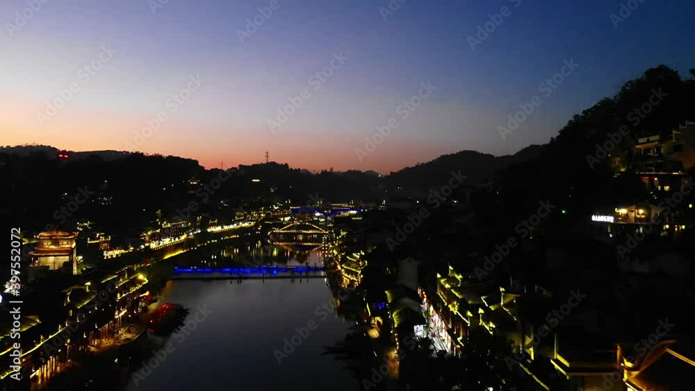 aerial view flying a drone of Fenghuang ancient town. Fenghuang old town Phoenix ancient town or Fenghuang County is a county of Hunan Province, China. aerial view flying a drone of Fenghuang ancient town. Fenghuang old town Phoenix ancient town or Fenghuang County is a county of Hunan Province, China.