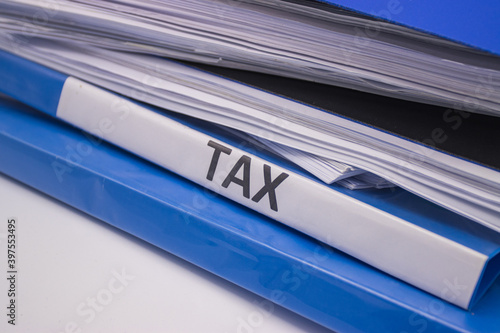 Folder Tax documents and paper files concept Annual tax payment