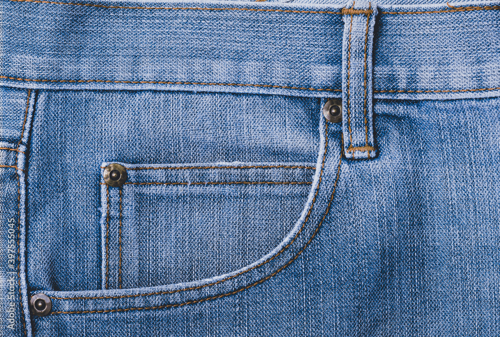 The blue jeans and pocket is a classic fashion. The blue jeans and pocket is a classic fashion.