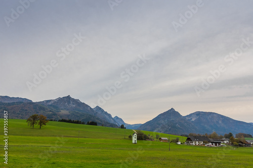 green meadow and top mountains in the background © thomaseder