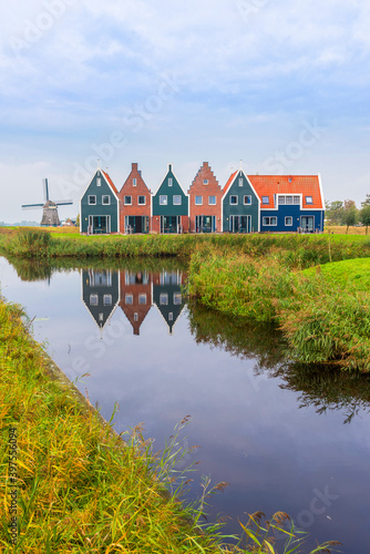 Volendam is a town in North Holland in the Netherlands. Colored houses of marine park in Volendam.