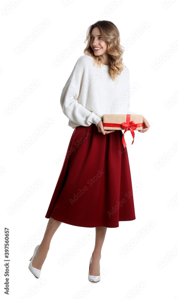 Beautiful young woman with Christmas present on white background Beautiful young woman with Christmas present on white background