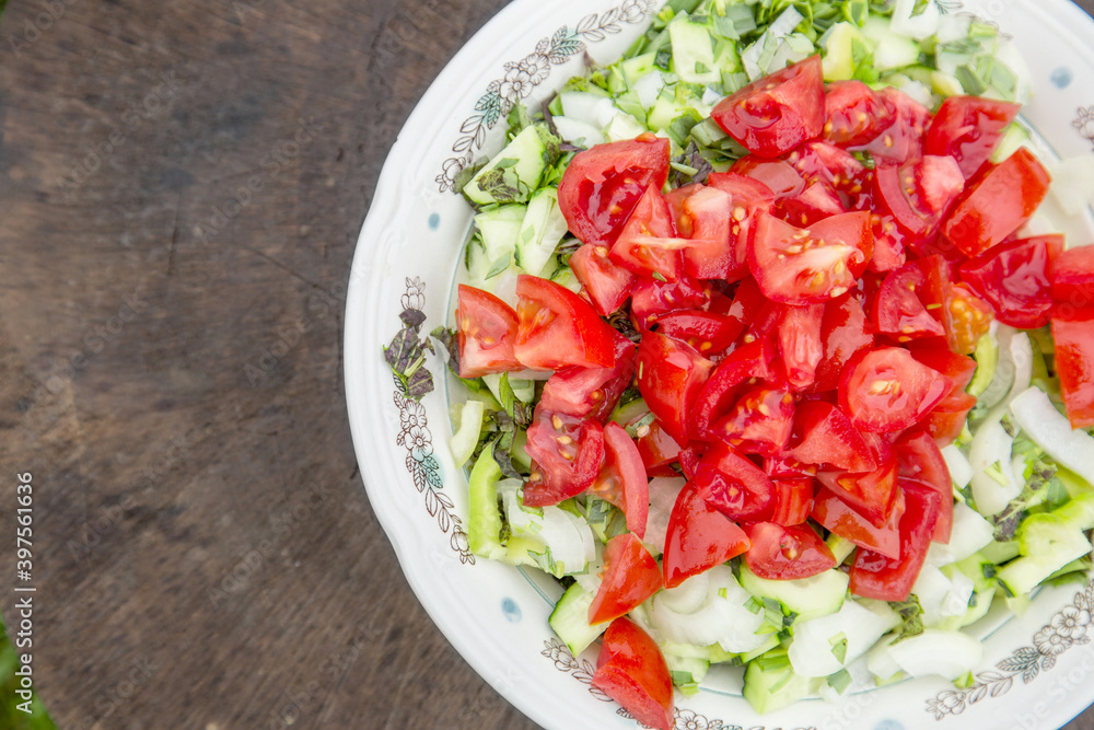 Salad of fresh tomatoes and cucumbers Salad of fresh tomatoes and cucumbers