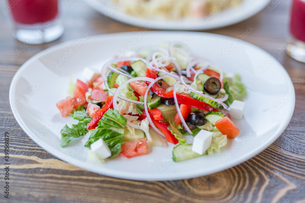 Greek salad with olives and cheese