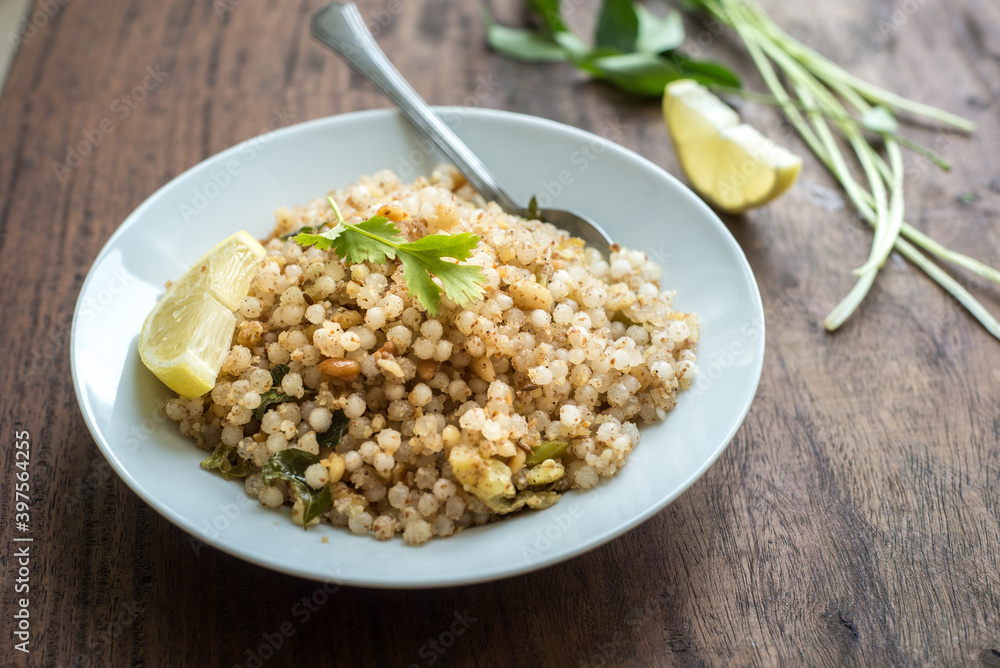 Sabudana Khichadi- a delicious recipe made with sago seeds. Typical Maharashtrian dish made to break the religious fast. Sabudana Khichadi- a delicious recipe made with sago seeds. Typical Maharashtrian dish made to break the religious fast.