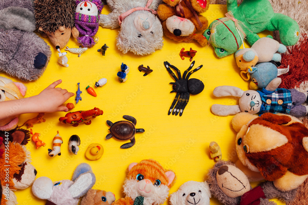 lots of children's soft toy for developing games as a background