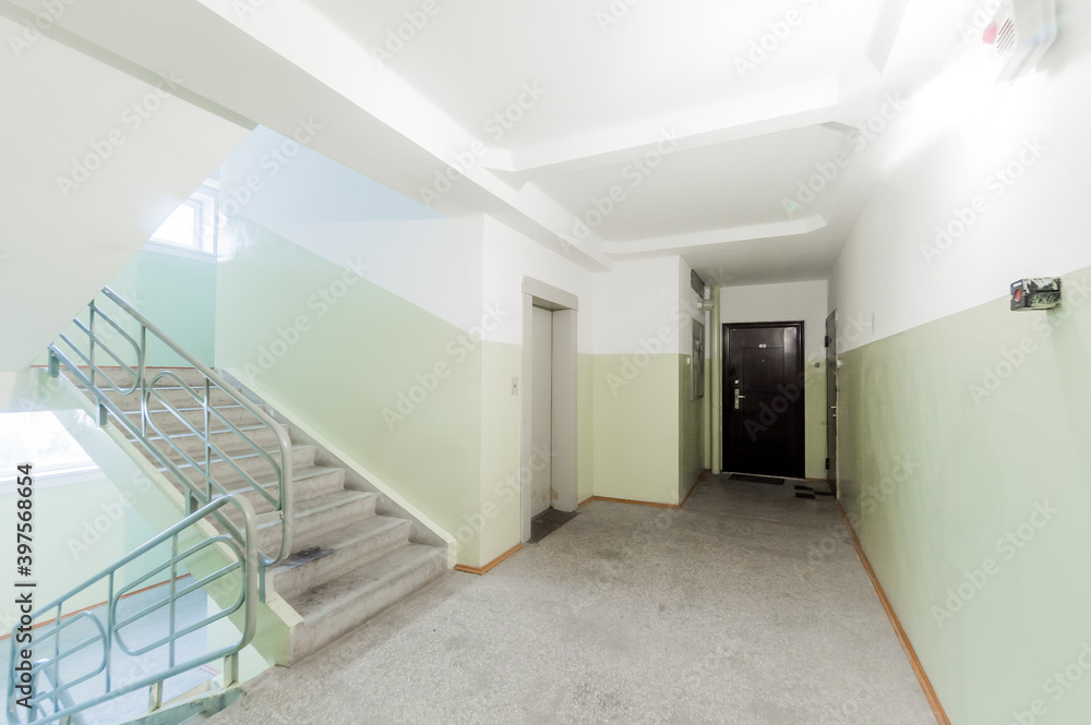 Russia, Moscow- April 17, 2020: interior public place, house entrance. doors, walls, staircase corridors, stairs, steps Russia, Moscow- April 17, 2020: interior public place, house entrance. doors, walls, staircase corridors, stairs, steps