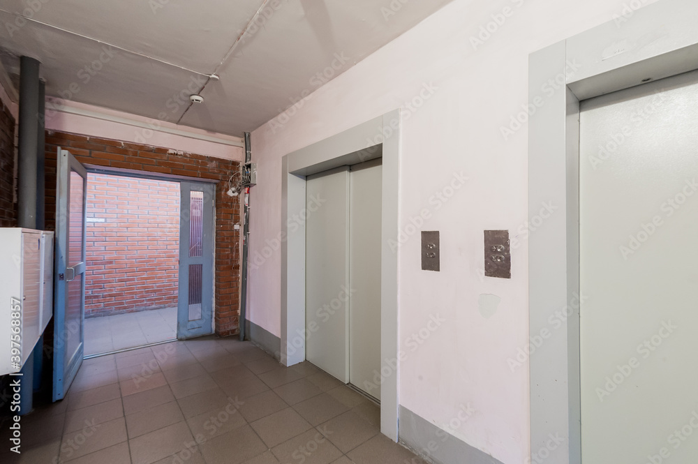 Russia, Moscow- April 17, 2020: interior public place, house entrance. doors, walls, staircase corridors Russia, Moscow- April 17, 2020: interior public place, house entrance. doors, walls, staircase corridors