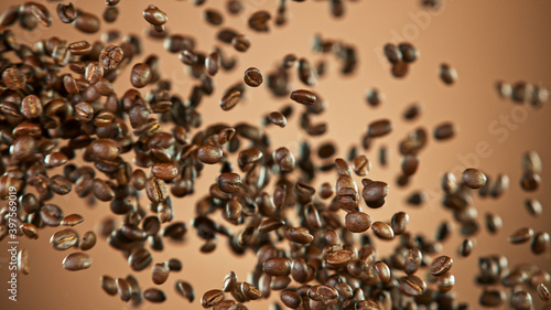 Flying coffee beans isolate...