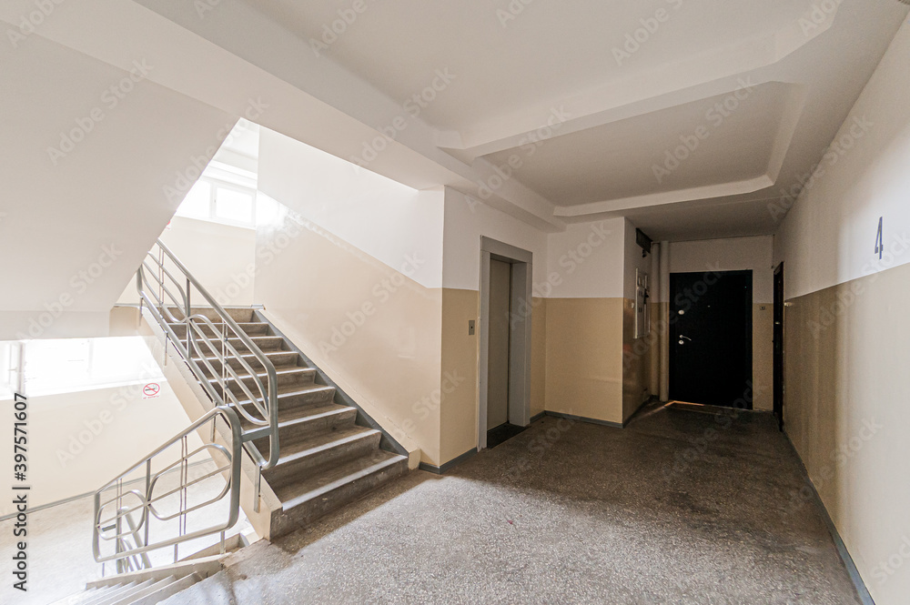 Russia, Moscow- April 17, 2020: interior public place, house entrance. doors, walls, staircase corridors, stairs, steps Russia, Moscow- April 17, 2020: interior public place, house entrance. doors, walls, staircase corridors, stairs, steps