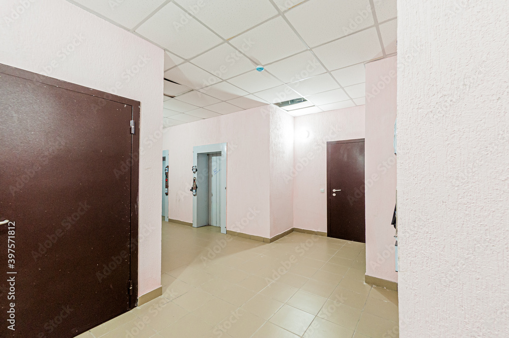 Russia, Moscow- April 17, 2020: interior public place, house entrance. doors, walls, staircase corridors Russia, Moscow- April 17, 2020: interior public place, house entrance. doors, walls, staircase corridors