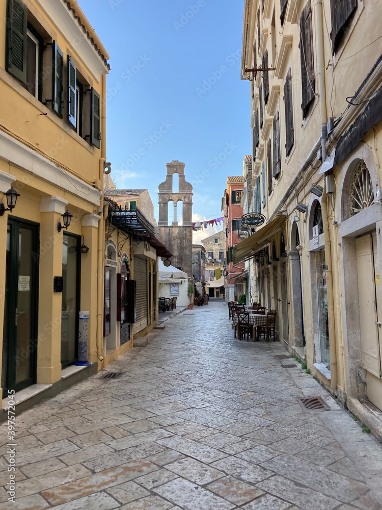 Fototapeta premium Ancient Corfu Town Street With Bell Tower