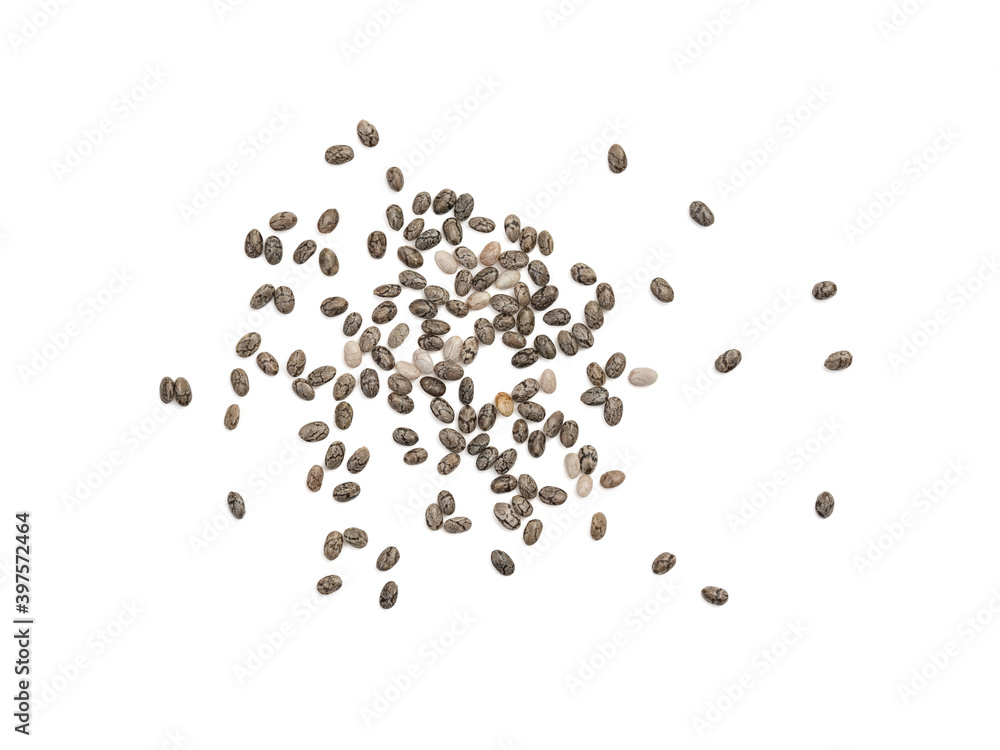 Spread out chia seeds seen directly from above and isolated on white background with shadows Spread out chia seeds seen directly from above and isolated on white background with shadows