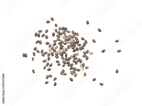 Spread out chia seeds seen directly from above and isolated on white background with shadows