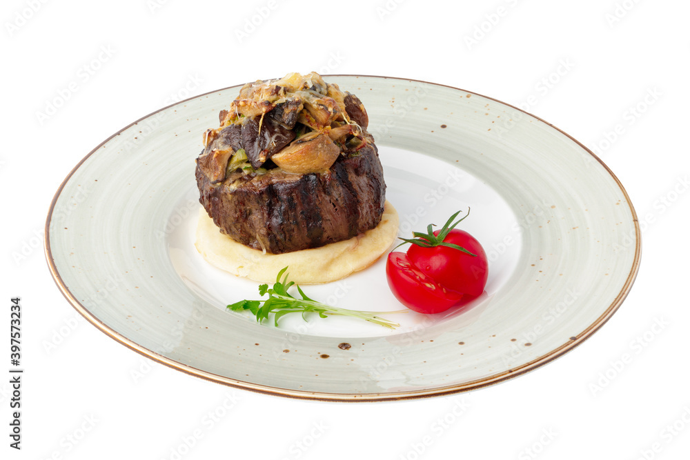 Grilled medallion of veal isolated on white Grilled medallion of veal isolated on white
