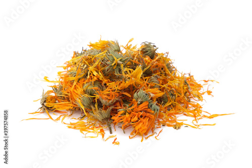 Dried healthy calendula flowers pile. Dry marigold petals heap on white. Alternative medicine.