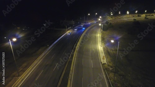 Cars in the avenue during night photo