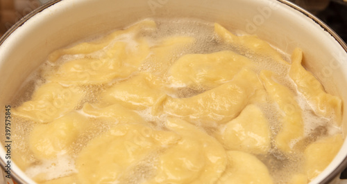 Dumplings cooked in a saucepan.