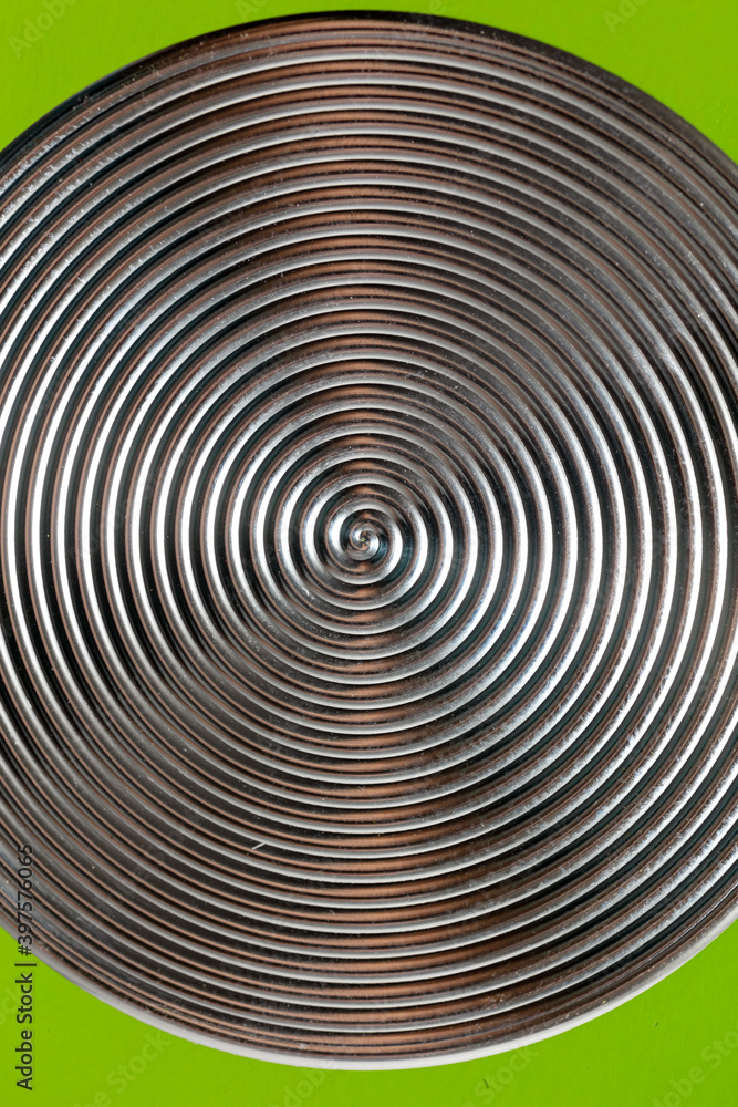 The bottom of a metal frying pan as an abstract background. The bottom of a metal frying pan as an abstract background.