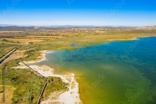 Ornithological nature park, shore of Vrana lake (Vransko jezero) in Dalmatia, Croatia, drone aerial view photo