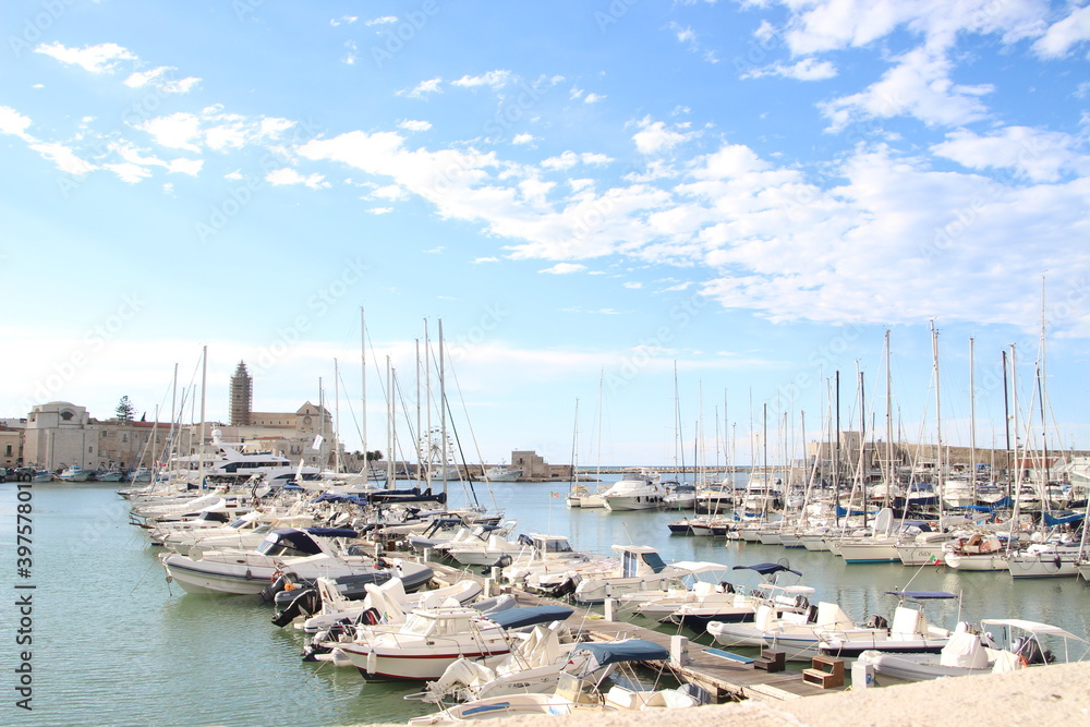 Yachting port in Trani with ferry wheel in the background