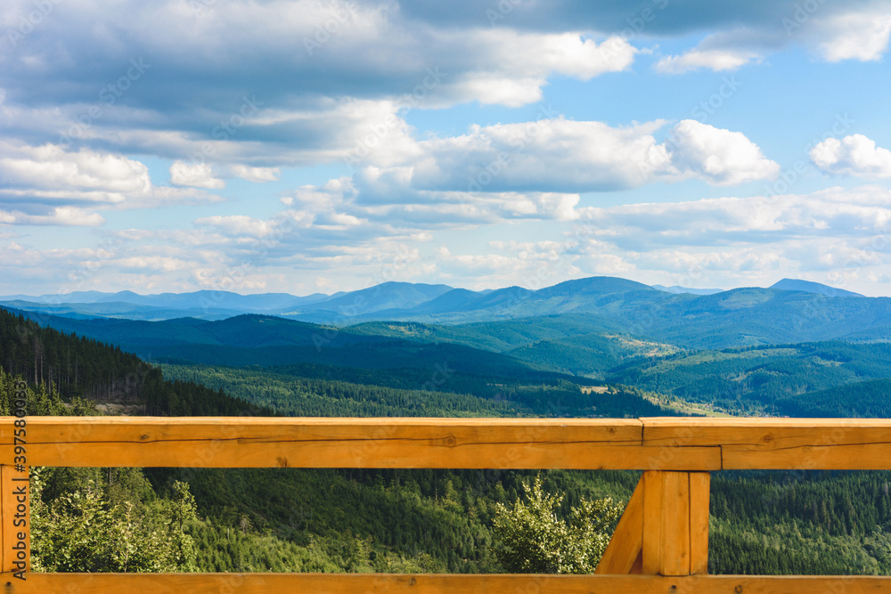 Beautiful view of the mountain range on the observation deck in the mountains of the Carpathians of Ukraine. Beautiful view of the mountain range on the observation deck in the mountains of the Carpathians of Ukraine.