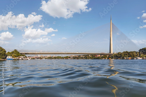 Cable supported, single pylon Ada Bridge, spanning Ada Ciganlija isle and banks of Sava river, in Belgrade, Serbia, Europe. photo