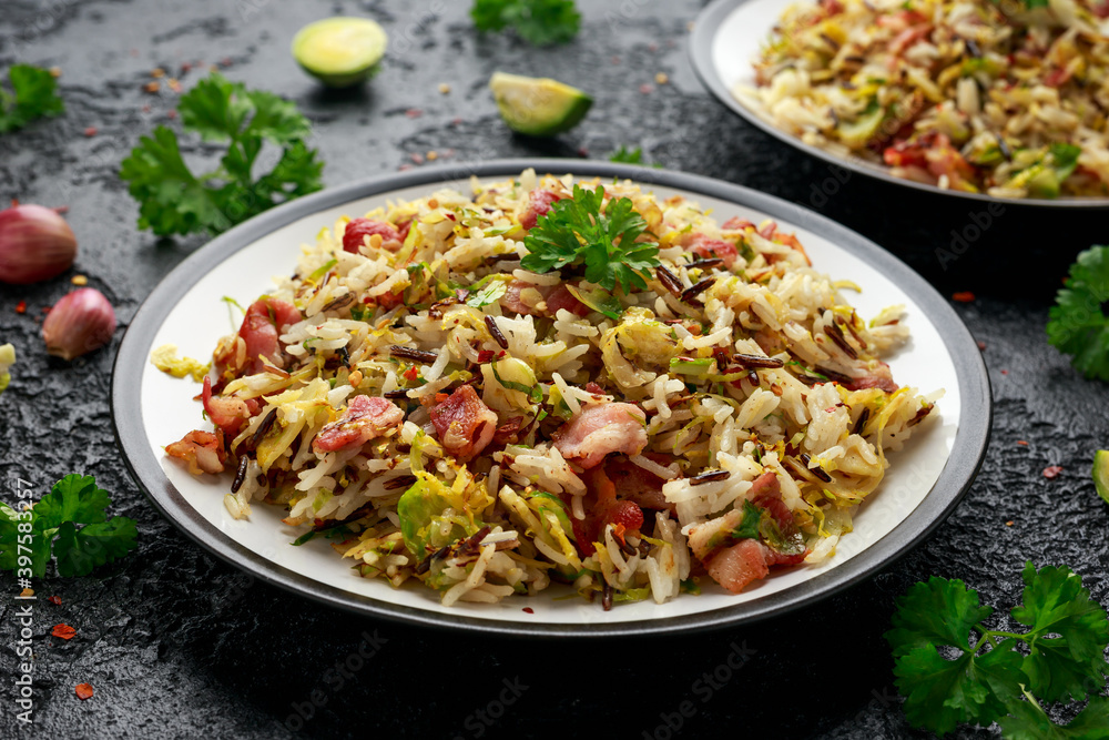 Fried Brussels sprouts with rice and crispy bacon