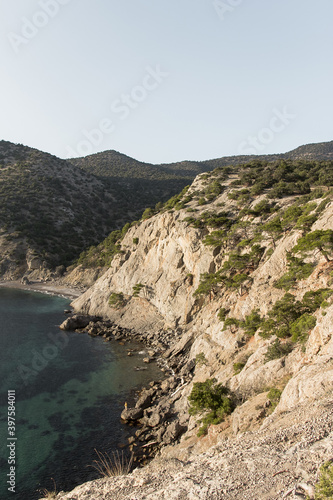Scenic view of bay with clear blue water from mountain path. The Golitsyn trail, Crimea. Rocky coast of the black sea. Seascape.