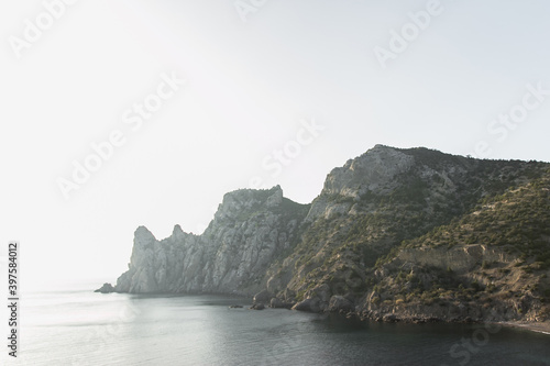 Scenic view of bay and on a rock like a unicorn from mountain path. The Golitsyn trail  Crimea. Rocky coast of the black sea. Seascape.