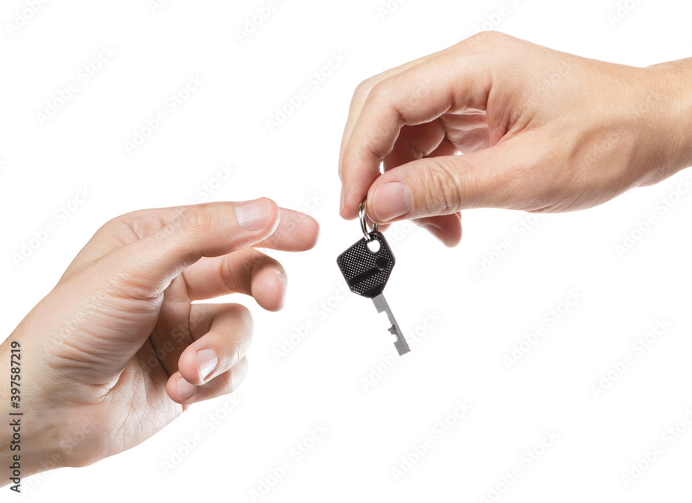 Hands giving and taking a key, isolated on white background Hands giving and taking a key, isolated on white background