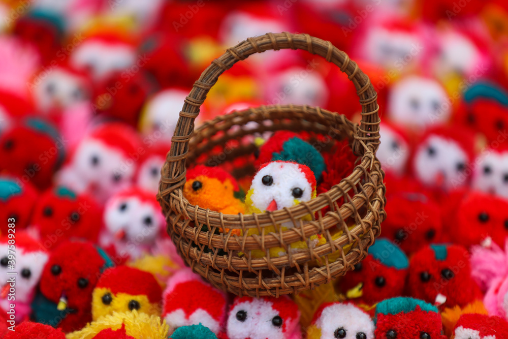 Bangladeshi street vendor sells Decorative dolls.