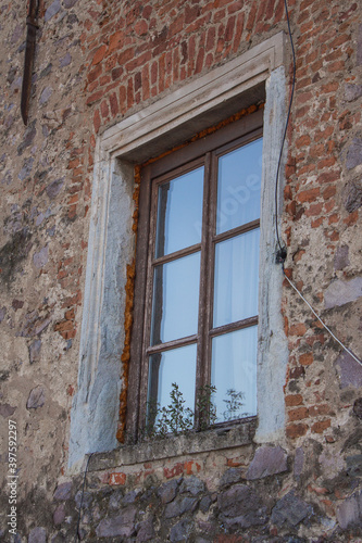 old window in the old wall