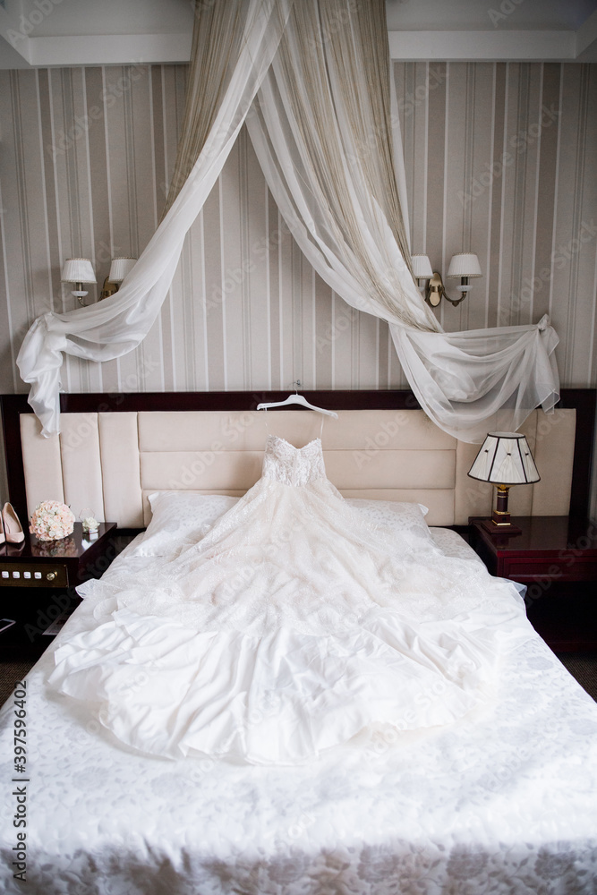 bride's wedding dress in the morning room