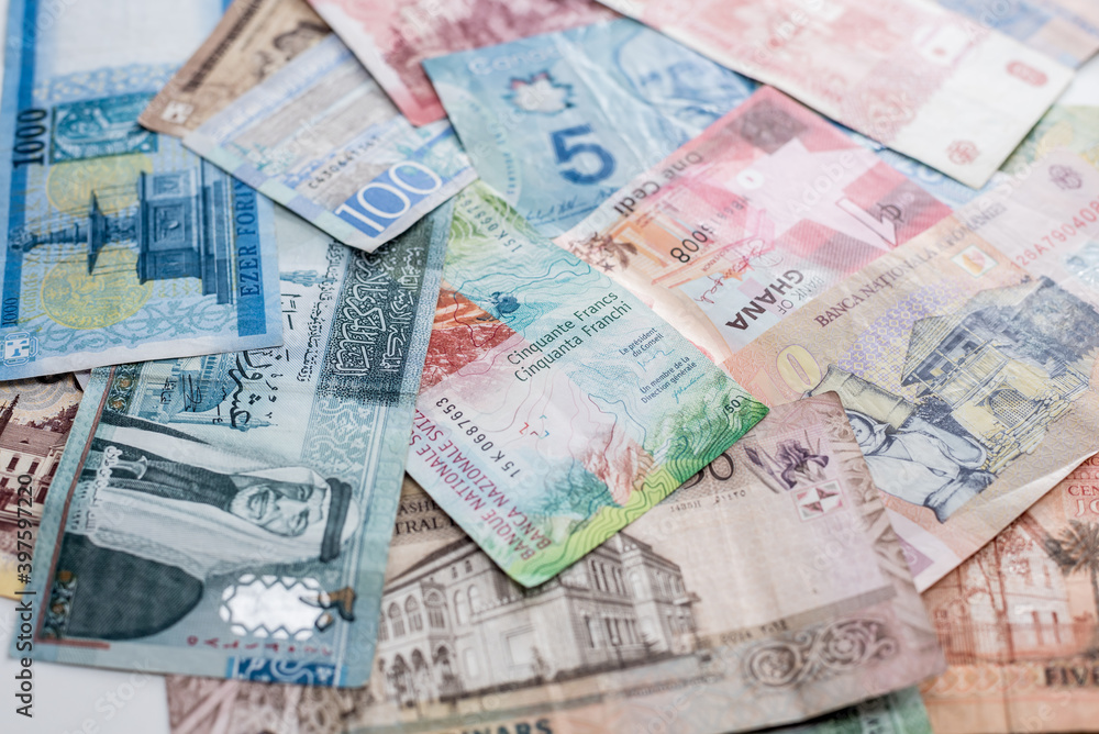 Fototapeta premium Paper money background of the different countries