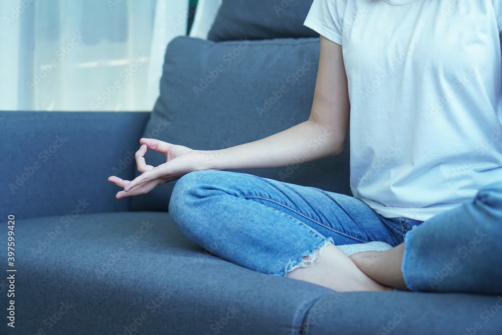 yogi woman practicing yoga lesson, breathing, meditating, indoor close up. Well being, wellness concept yogi woman practicing yoga lesson, breathing, meditating, indoor close up. Well being, wellness concept