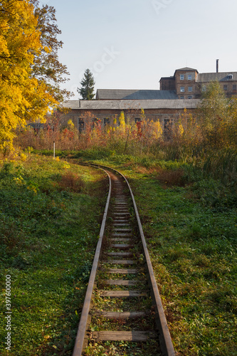 Narrow gauge railway in the autumn park. Old children's railway