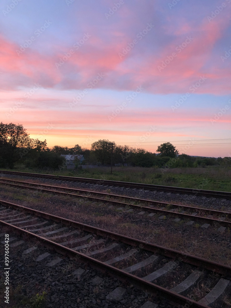 Fototapeta premium railway at sunset