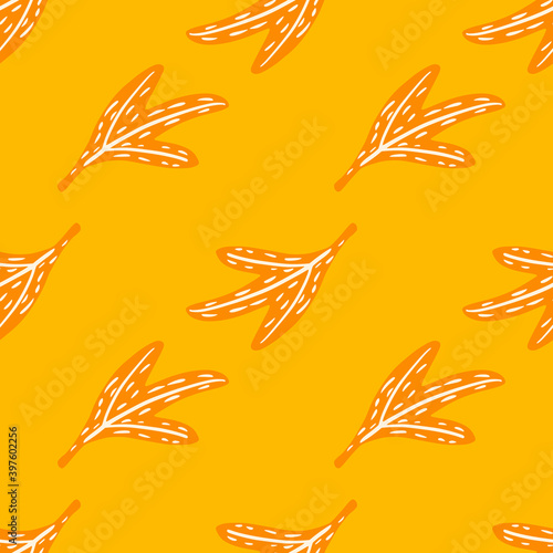 Summer bright seamless nature pattrn with abstract leaf silhouettes. Orange and yellow colored design. photo