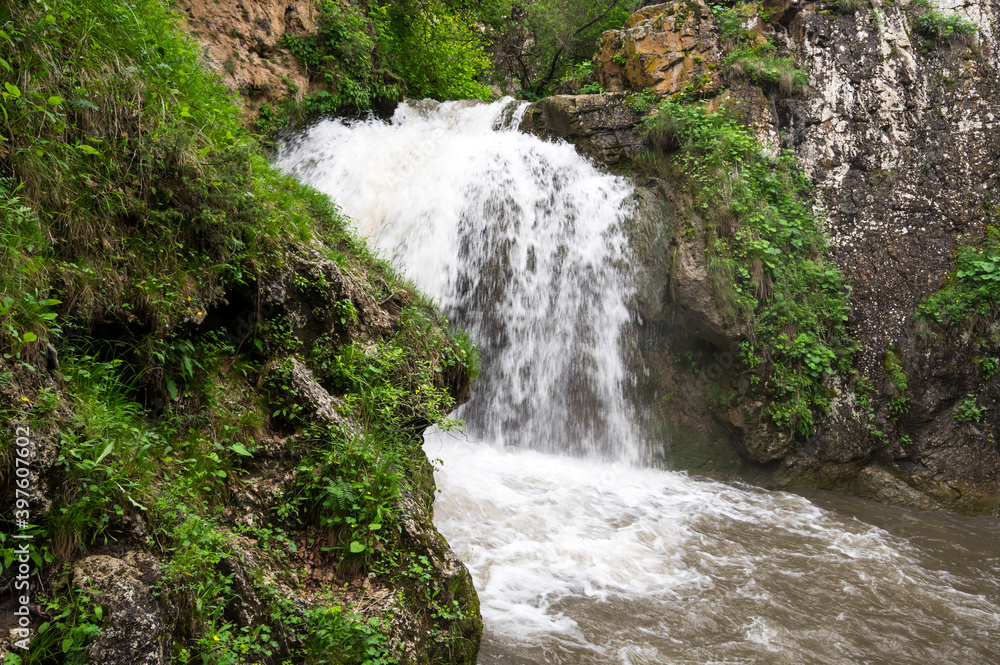 Naklejka premium View of waterfall in Caucasus mountains