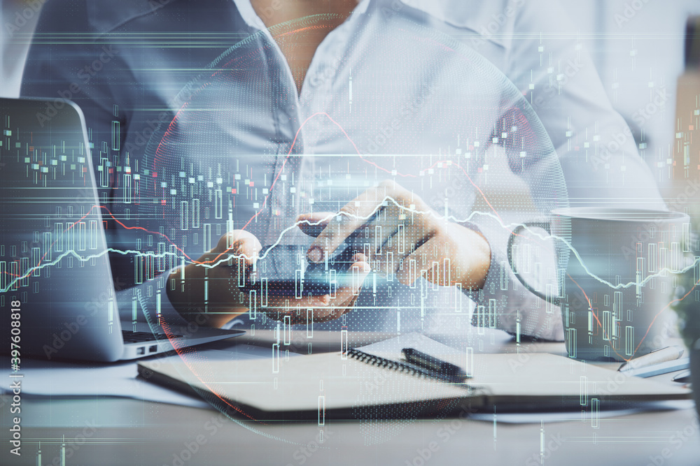 Double exposure of forex chart sketch hologram and woman holding and using a mobile device. Financial market concept.