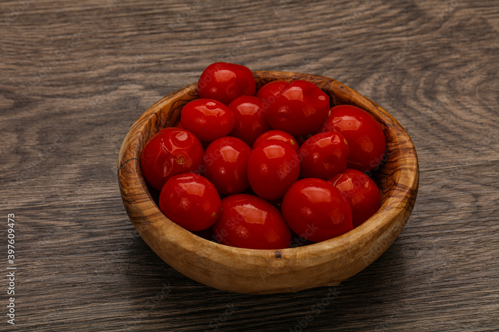 Pickled cherry tomatoes in the bowl Pickled cherry tomatoes in the bowl