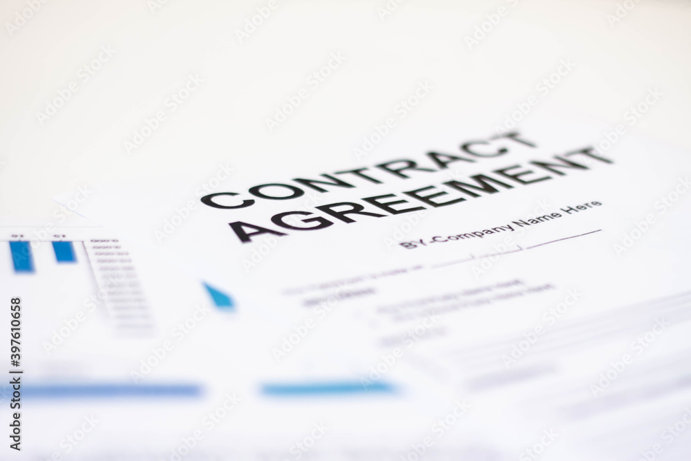 Contract papers lie on a white table. Business development concept. Contract papers lie on a white table. Business development concept.