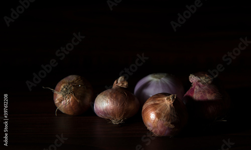 onions on dark background