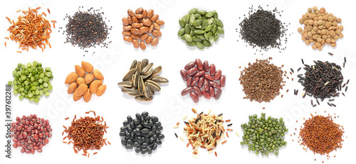 Collection of dry organic cereal and grain seed pile on white background consisted of rice, quinoa, pinto, pumpkin, sesasme, chia, lentils, mung bean, almond, sunflower and flax seeds