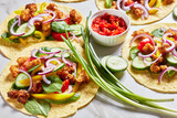 chicken street corn tacos with veggies and salsa