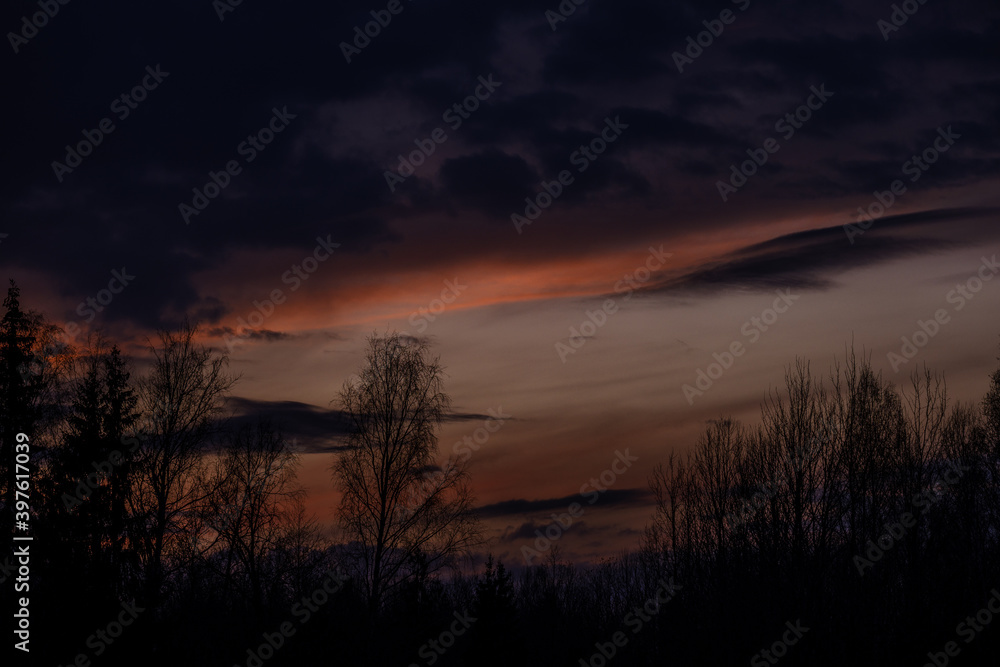 dramatatic red dark sunset over the fields and cities dramatatic red dark sunset over the fields and cities