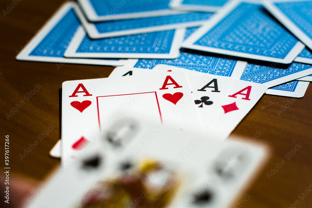 Playing cards are laid out on the table, pictures up and pictures down
Playing cards are laid out on the table, pictures up and pictures down