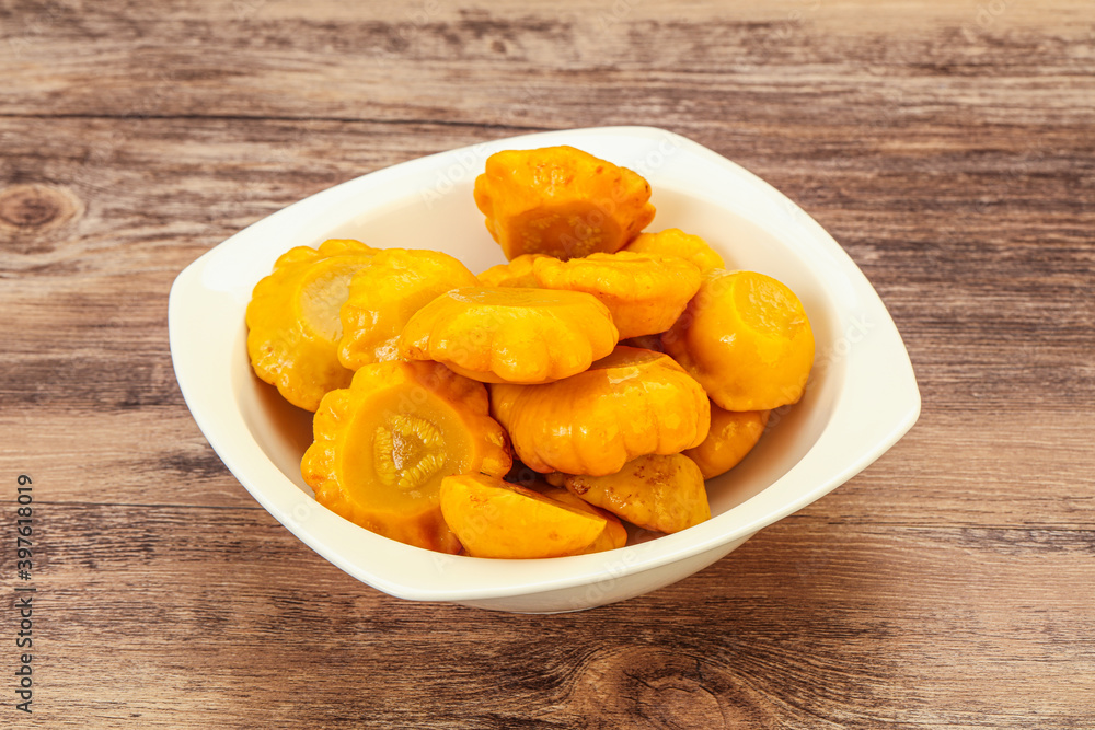 Marinated yellow patisson in the bowl Marinated yellow patisson in the bowl