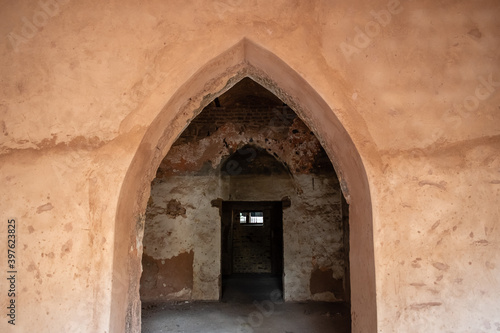 Bhopal  Madhya Pradesh  India - March 2019  The arched doorway at the entrance to the old ruins of a Nawab era monument in the old town area of Bhopal.